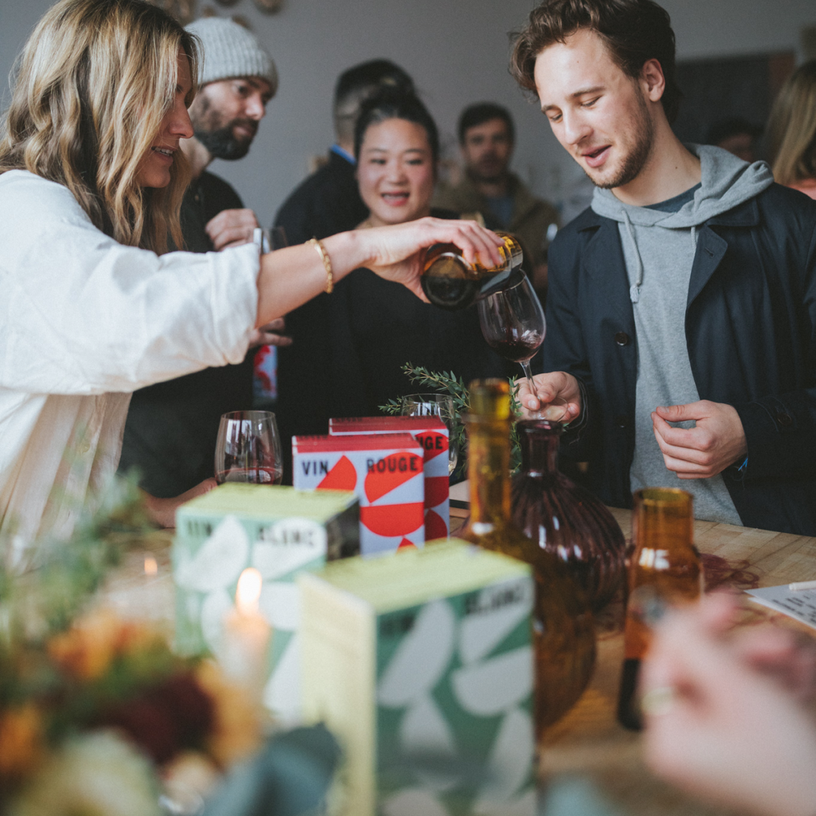 People enjoying boxed wine